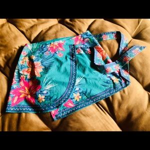 Mini sarong wrapped skirt in brightly colored tropical batik print